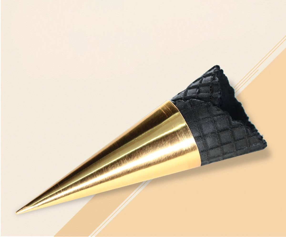 Gold foil cone wrapper with a dark textured tip