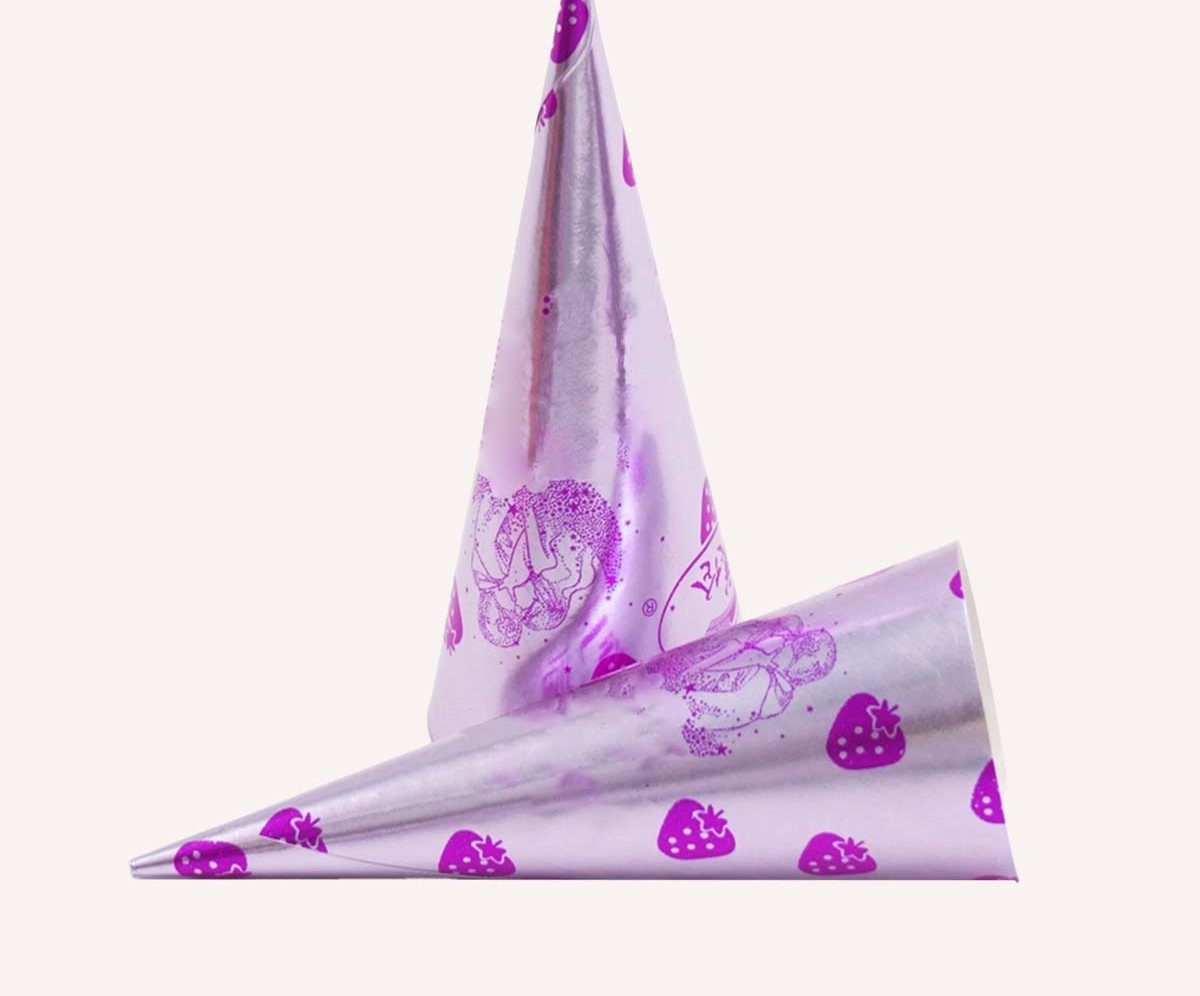 Lilac foil cone wrappers printed with a berry pattern, laid flat