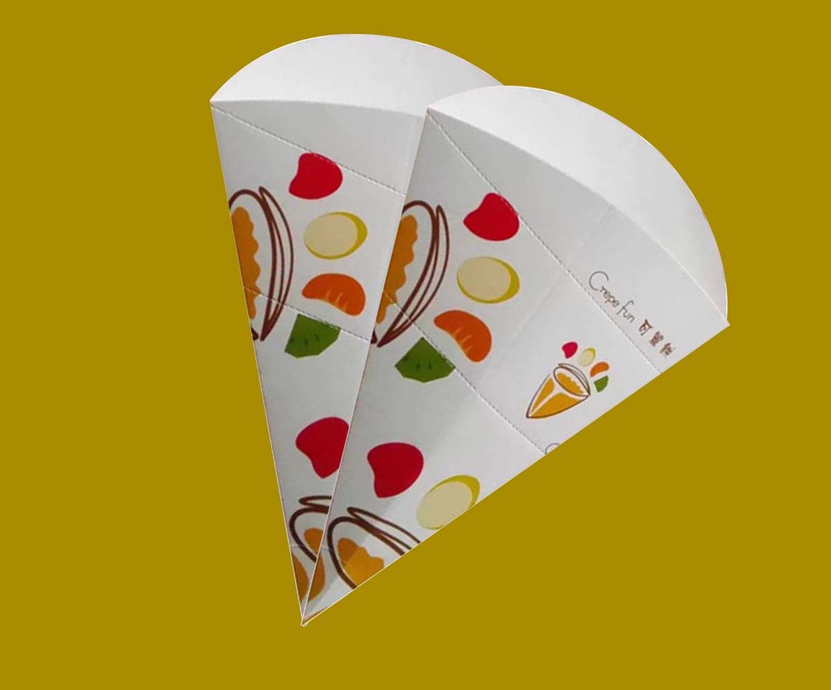 Fan-shaped printed crepe wrap opened flat to show the artwork