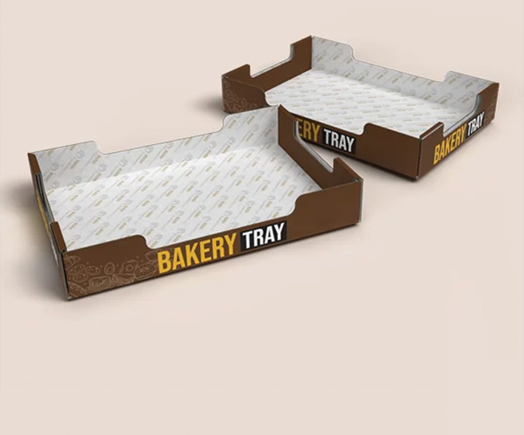 Pale scalloped bakery tray printed with a small brand mark