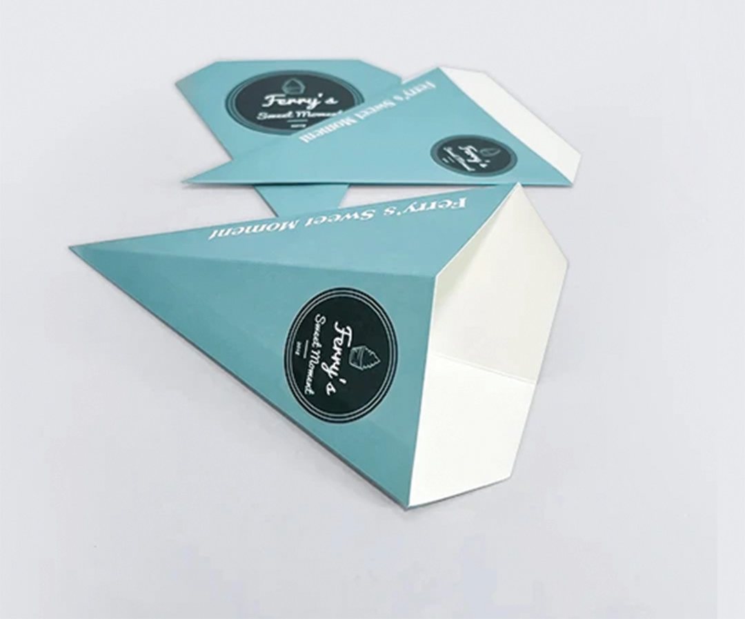 Teal triangular crepe packaging printed with a bakery logo