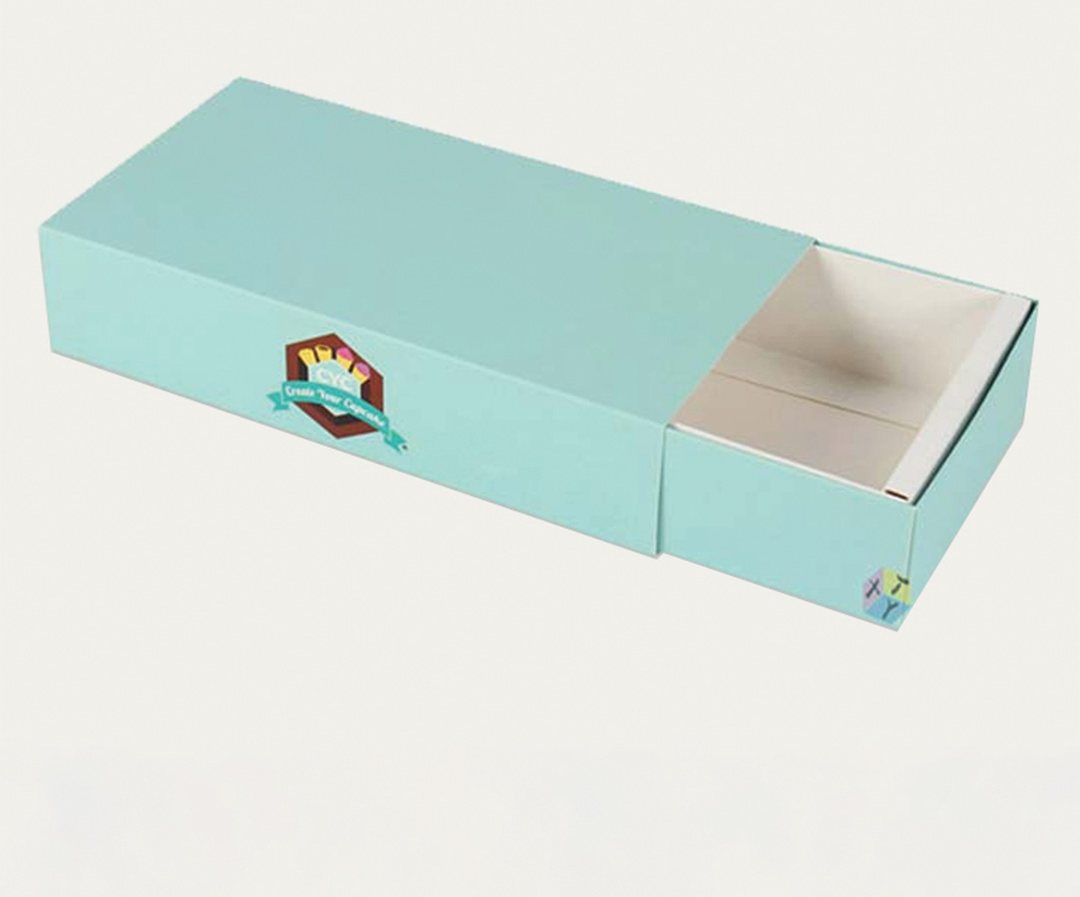 Teal dessert sleeve slid open to reveal the inner drawer tray