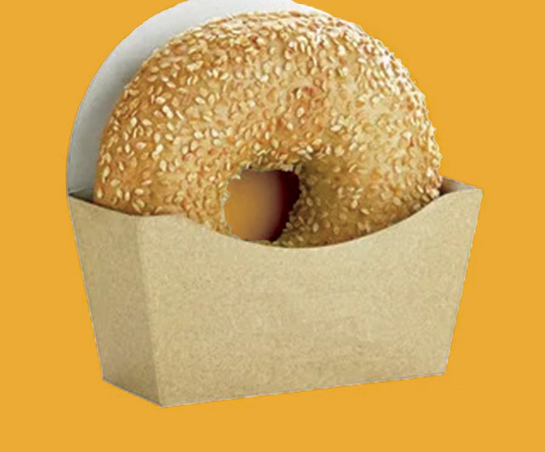 Kraft board donut sleeve holding a sesame topped bagel