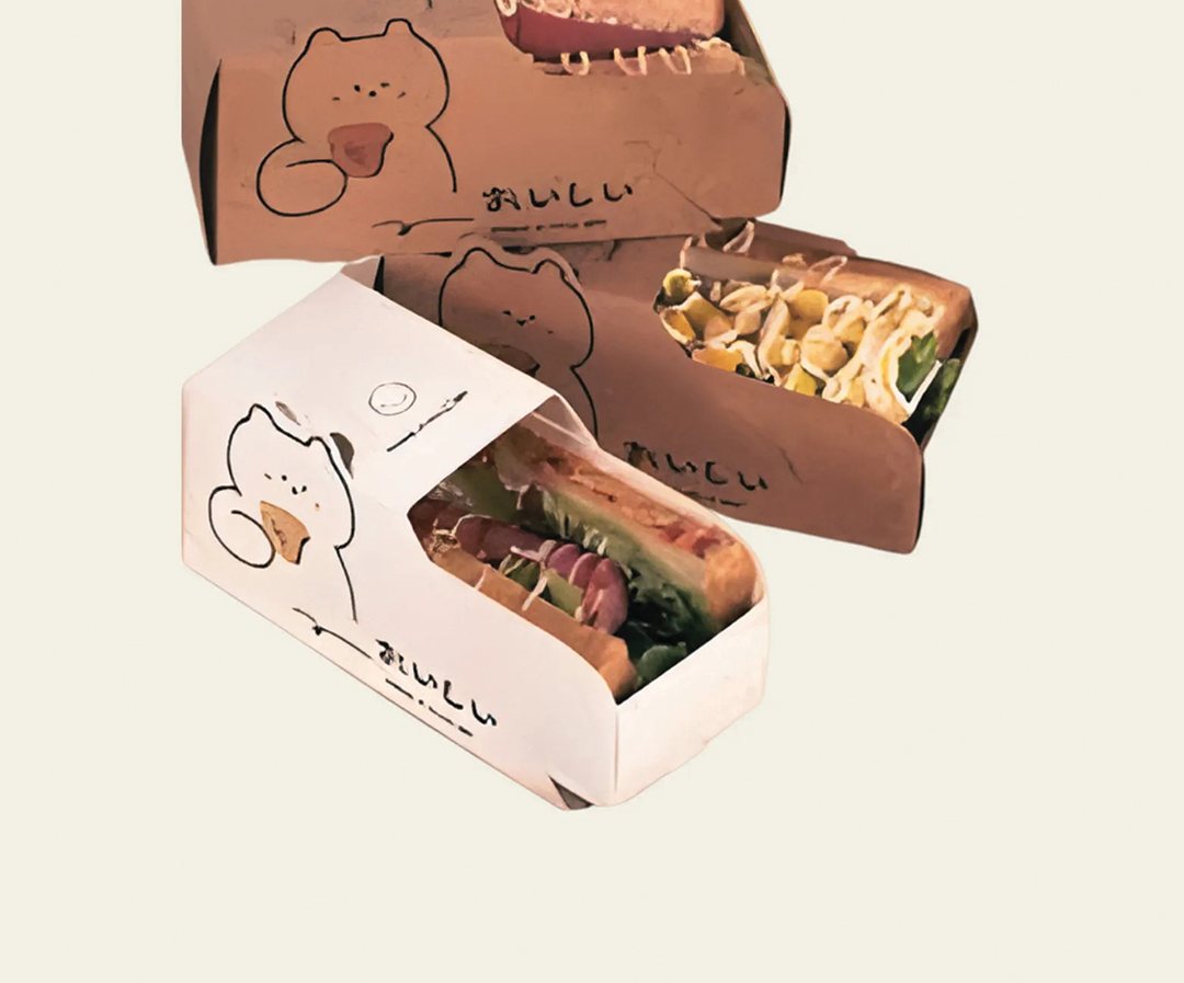 Kraft hot dog trays printed with a character illustration