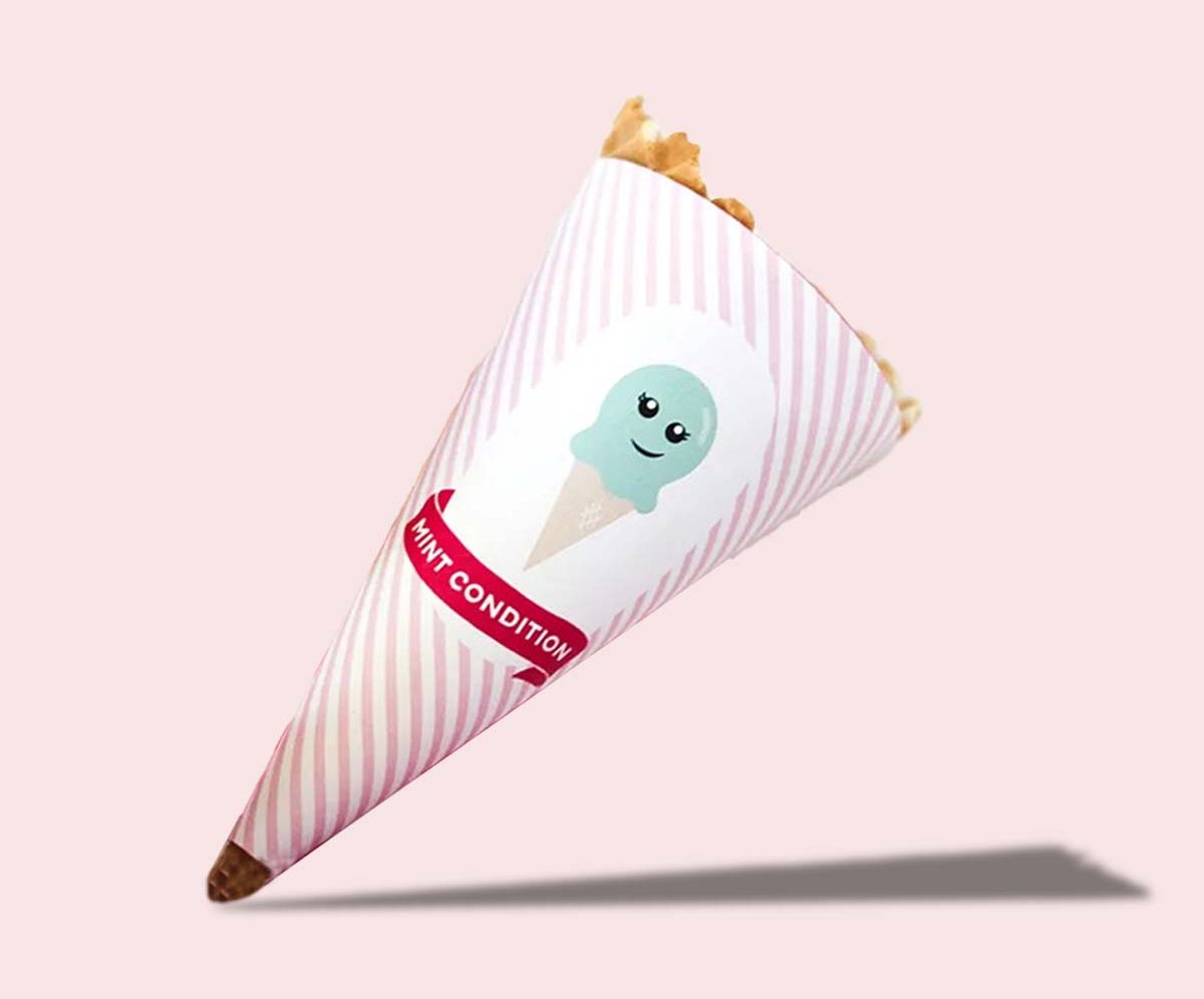 Striped cone wrapper closed around a filled cone with a character label