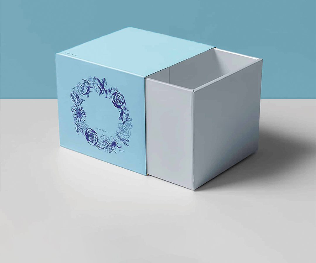 Pale blue sleeve part drawn off a grey inner drawer tray