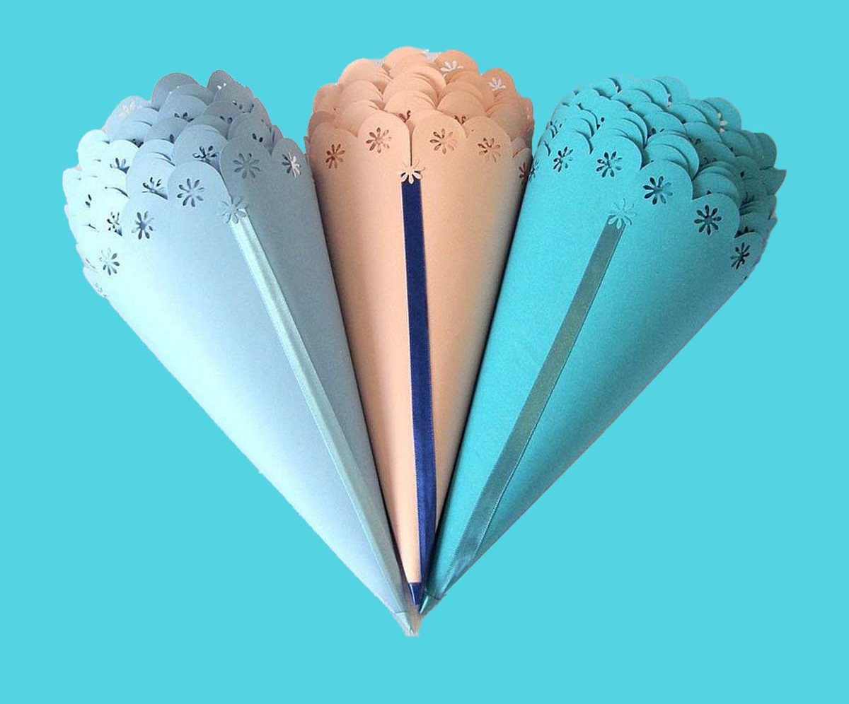 Fan of pale blue paper cone sleeves printed with a snowflake pattern