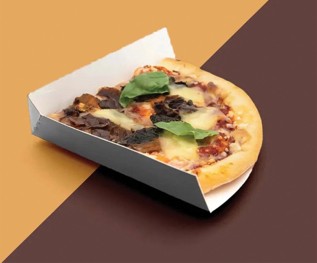 Board slice tray holding a topped pizza against a two-tone backdrop