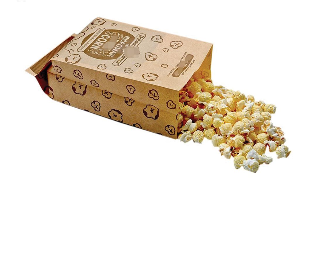 Kraft popcorn sleeve tipped over with popcorn spilling out