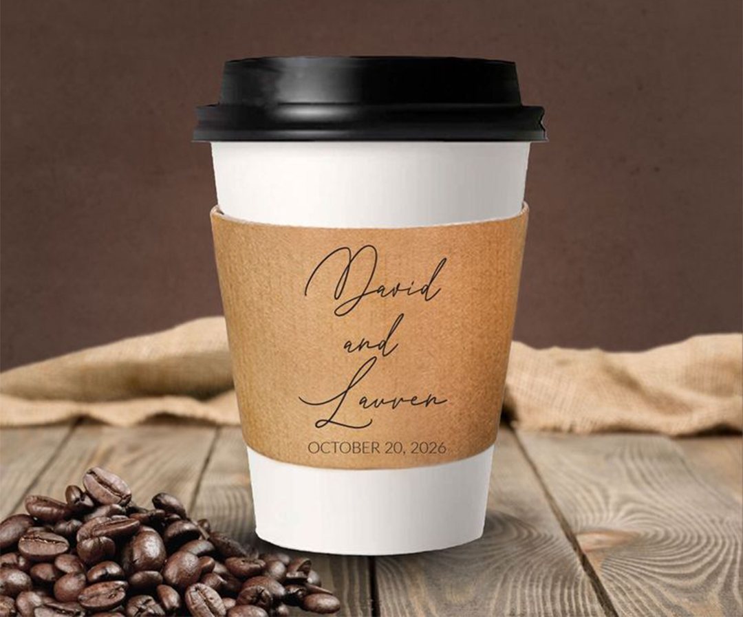 Kraft coffee sleeve personalized for a wedding, on a lidded cup