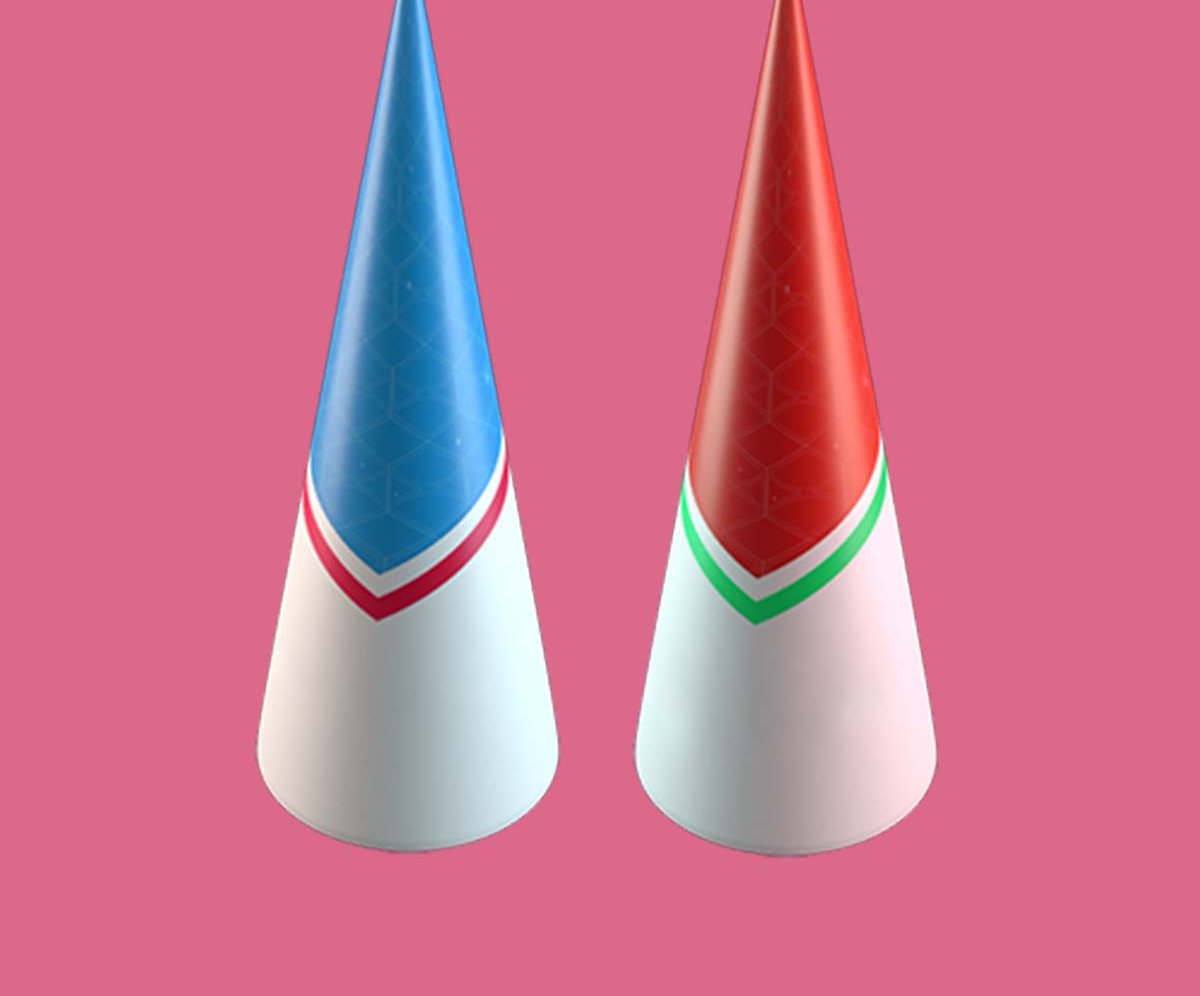 Blue and red sugar cone sleeves standing upright on a pink backdrop