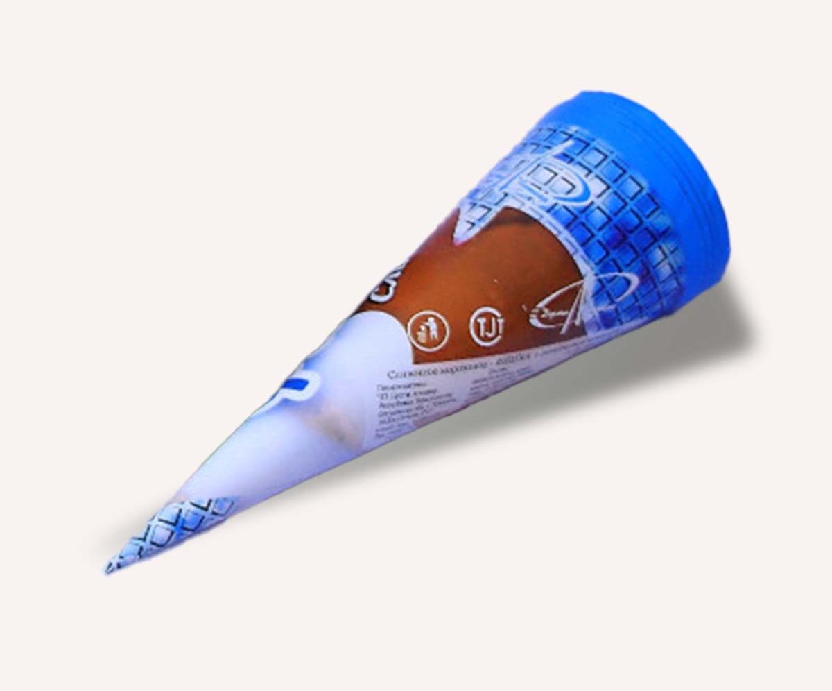Blue printed cardboard cone sleeve photographed on a white surface