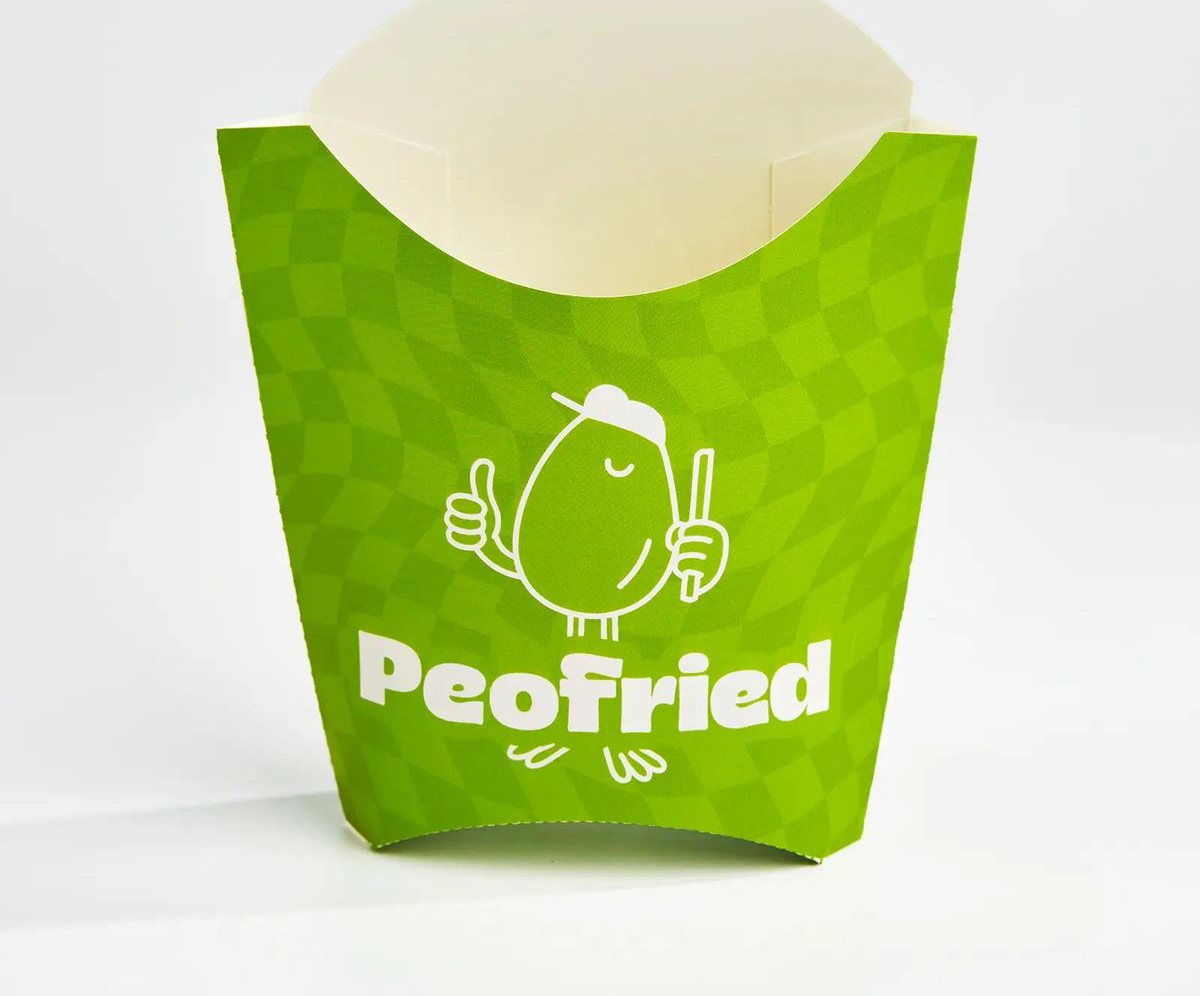 Green printed fry scoop carrying a cartoon potato character