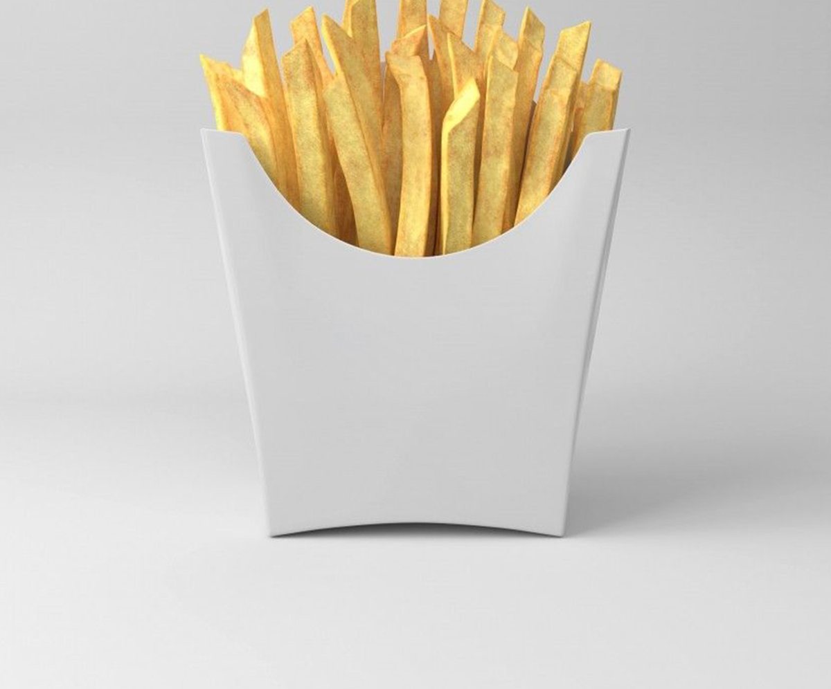 Plain white fry scoop filled to the rim with fries