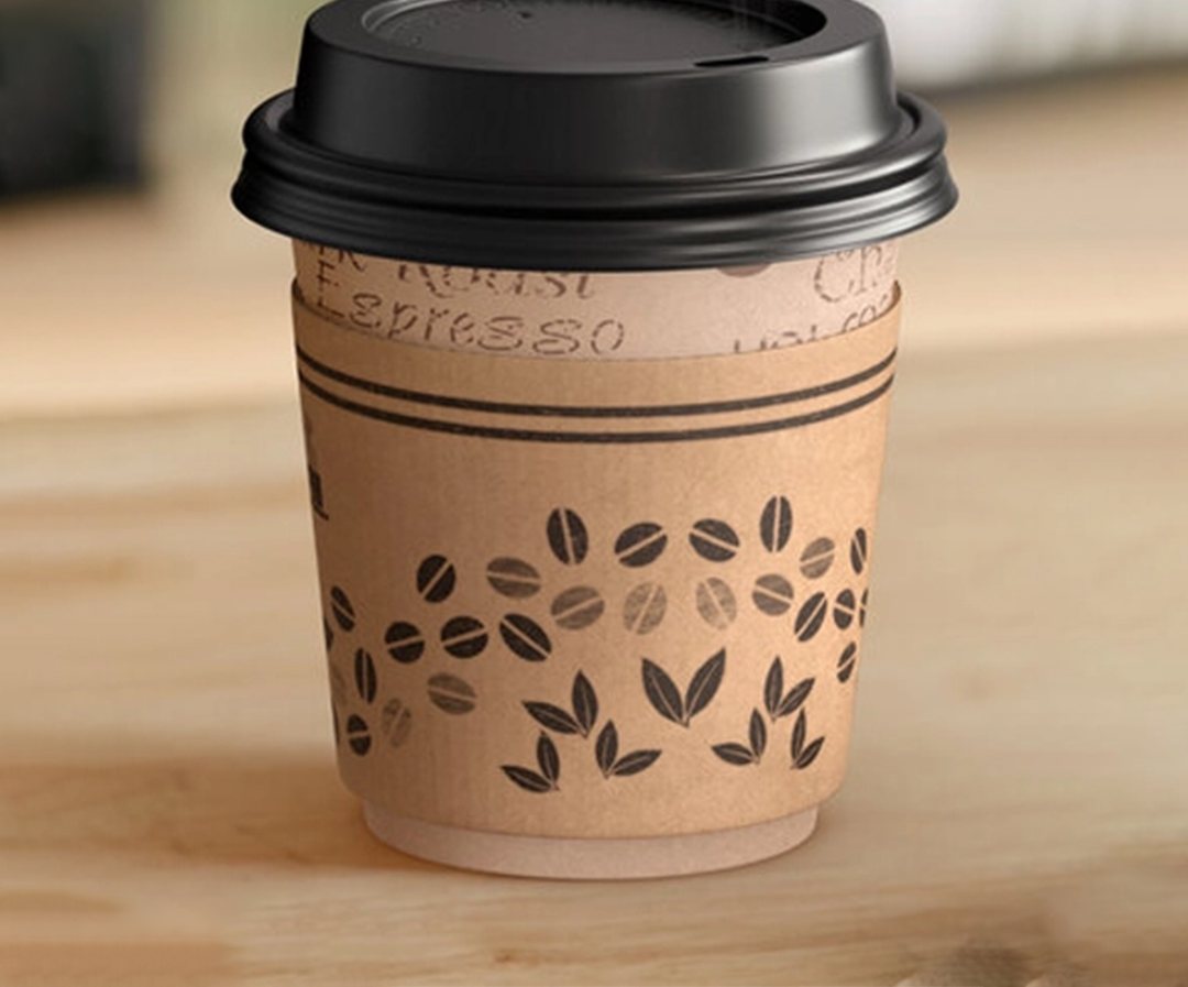 Kraft cup sleeve printed with a coffee bean pattern in one ink